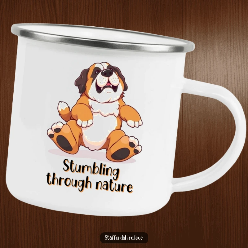Funny camping mug with a Saint Bernard tripping over its feet, perfect for outdoor drinks with a humorous twist.