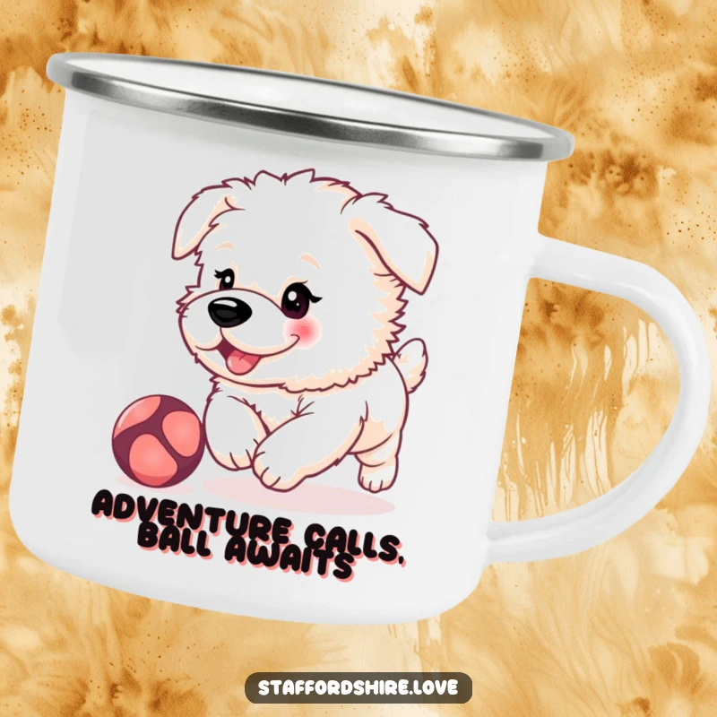 Funny, fluffy Staffordshire puppy with rosy cheeks, playfully chasing a bouncing ball on a durable enamel camping mug.