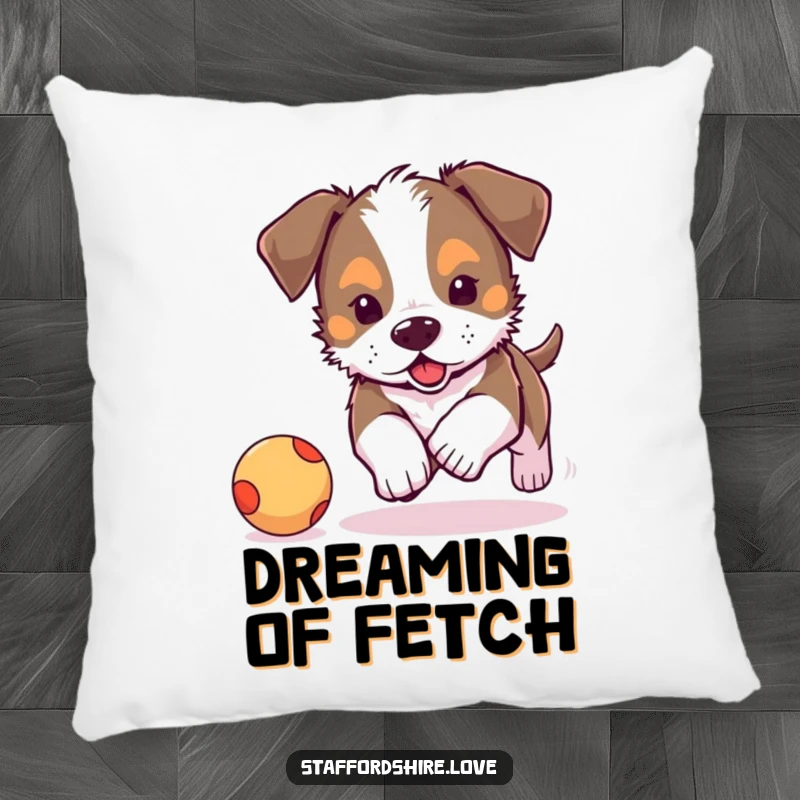 Funny, cute Staffordshire puppy chasing a bouncy ball on a soft pillow. Ideal funny gift for comfort.