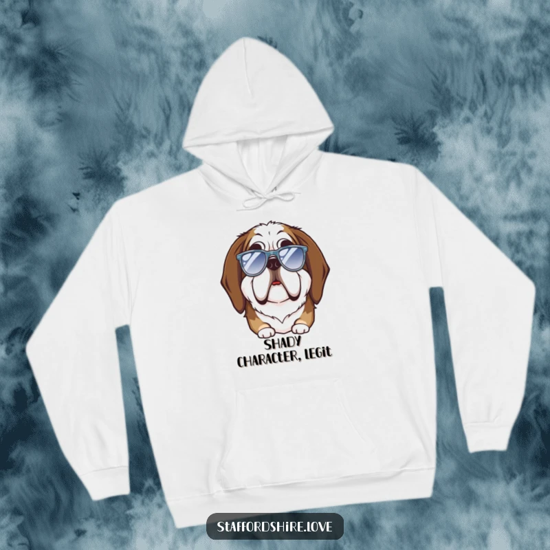 Funny Saint Bernard hoodie showing a big dog with a dopey expression trying on tiny sunglasses, perfect for cold weather.