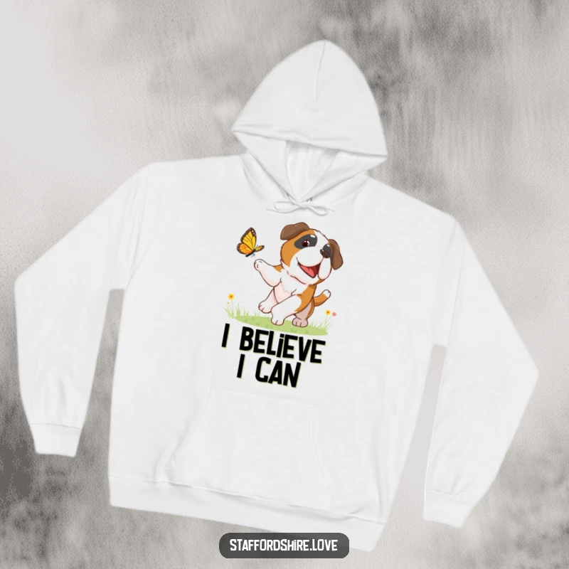 Funny hoodie showcasing a joyful Saint Bernard dog in mid-chase after a delicate butterfly, embodying pure, unadulterated fun.