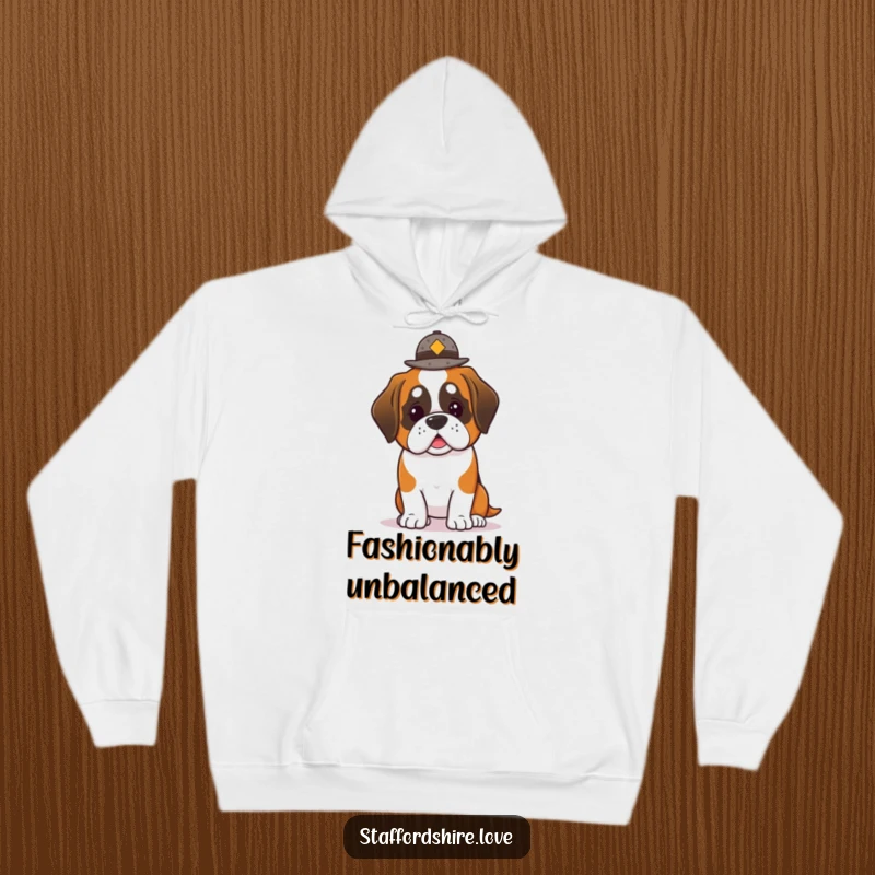 Funny Saint Bernard Hoodie: Soft hoodie depicting a lovable kawaii Saint Bernard dog attempting to balance a small hat.