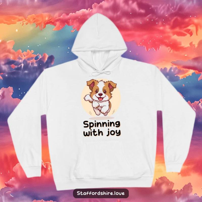 Funny hoodie featuring a Staffy puppy chasing its tail in a circle, offering humorous warmth and capturing canine joy.
