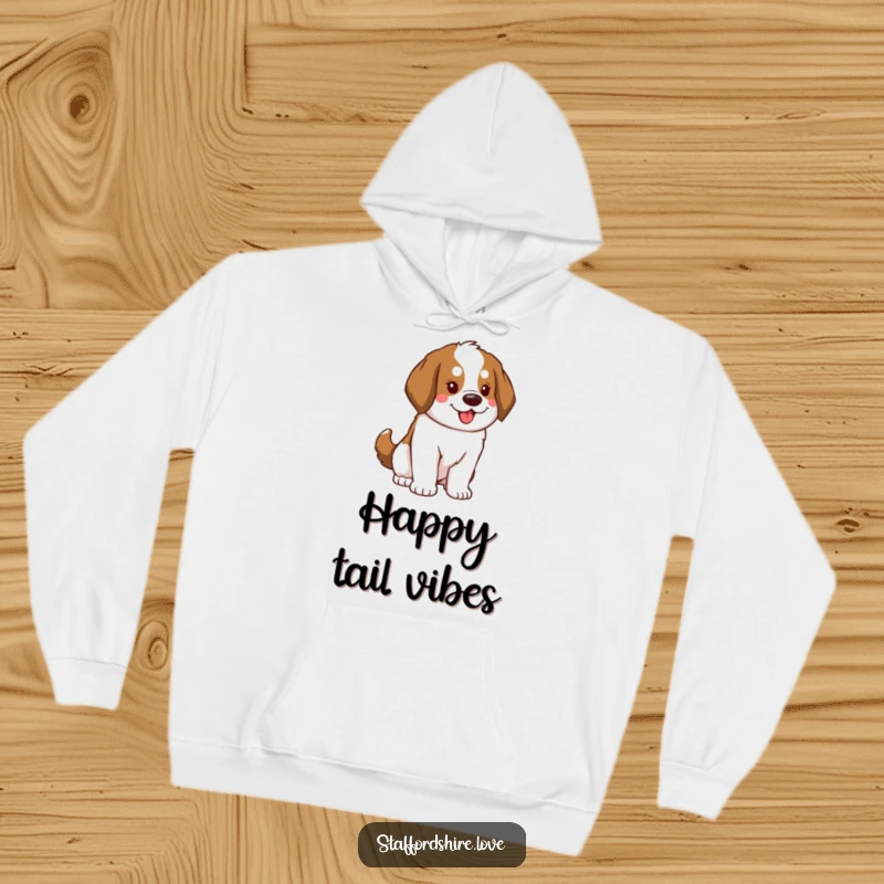 Funny Saint Bernard Hoodie featuring a dog with a fluffy tail swaying enthusiastically, offering warmth and a contagious energetic vibe.