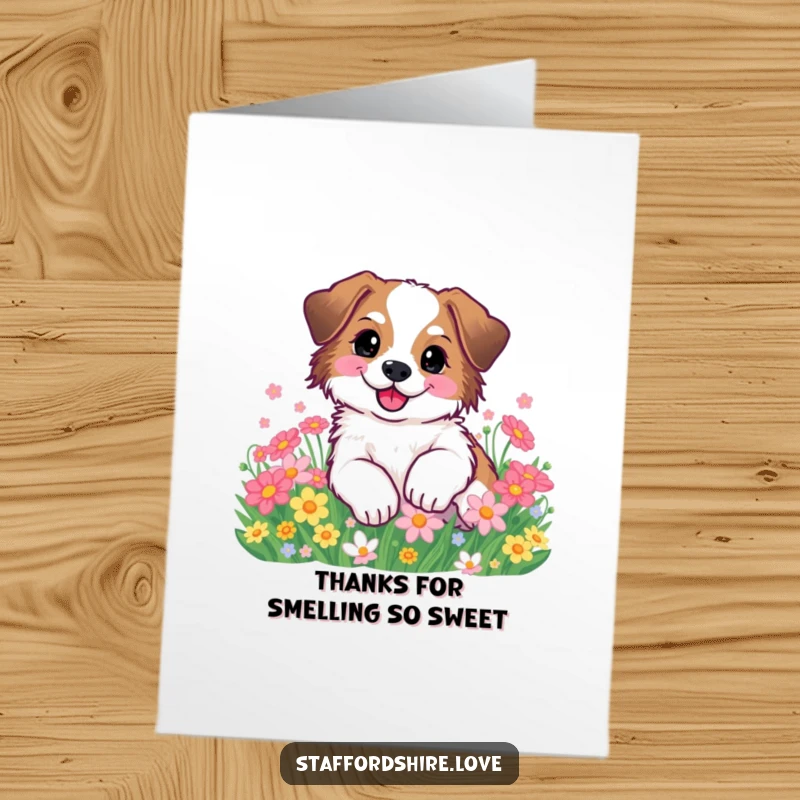 Funny Free Printable Thank You Card depicts a happy Staffordshire rolling joyfully among flowers, a sweet expression of thanks.